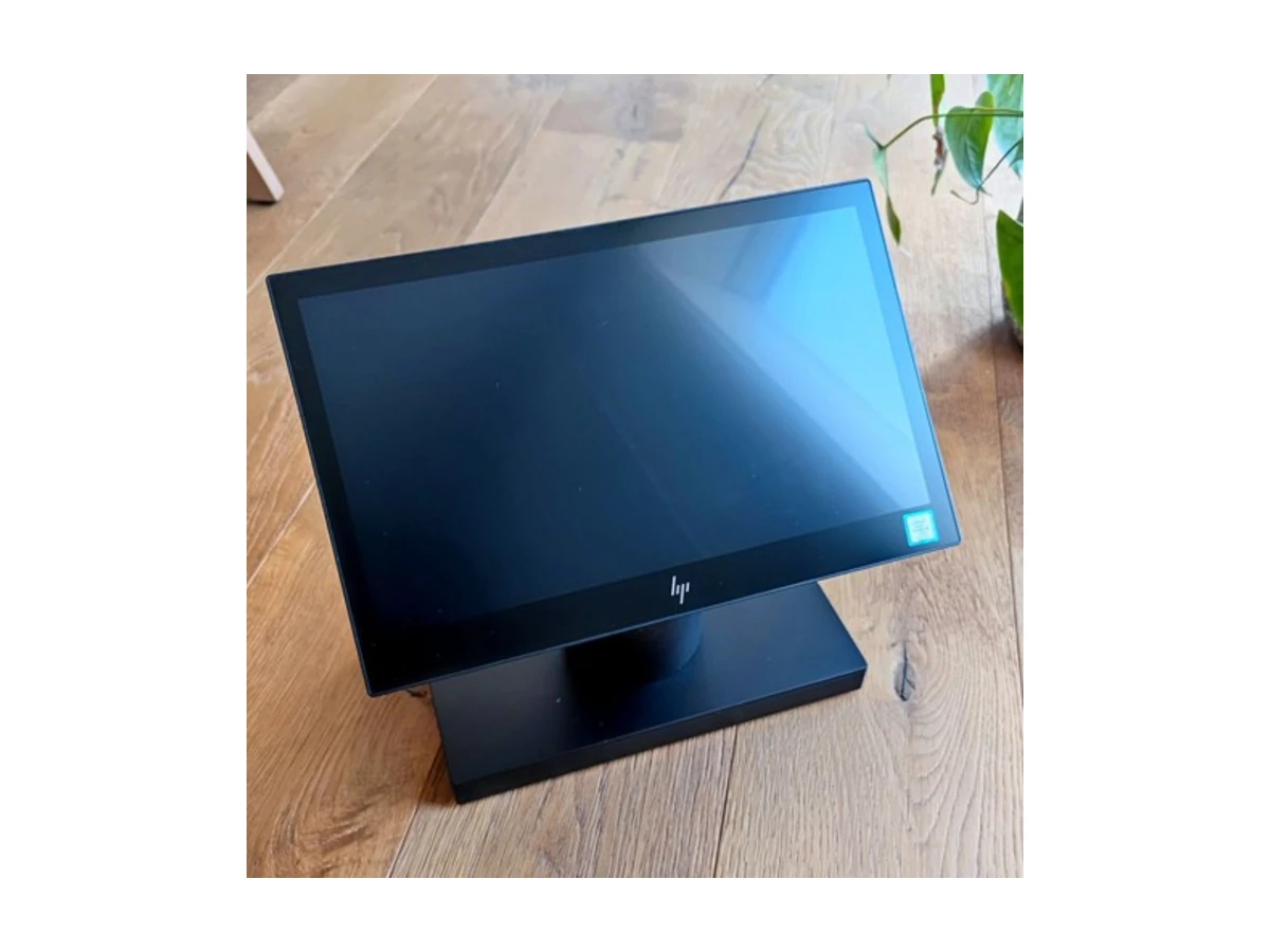 An HP Engage One 145 all-in-one POS terminal on its stand